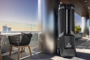 A blue Axis Portable Air rental cooling unit